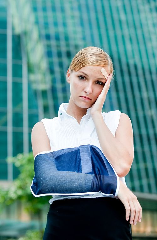 Bigstock_Businesswoman_With_Injured_Arm_5284085