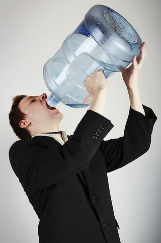 Bigstock_Man_With_Huge_Water_Bottle_1999993