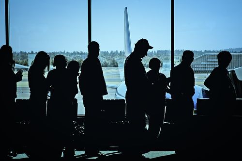 Bigstock_Travelers_At_Airport_2437919