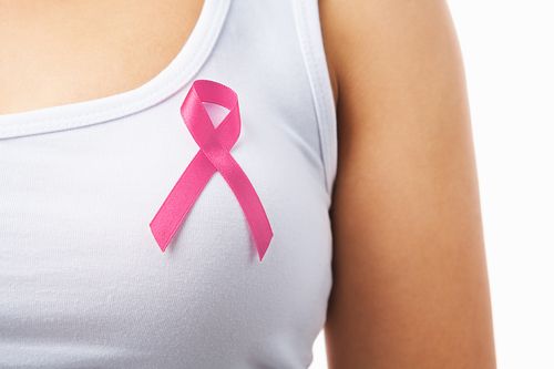 Bigstock_Pink_Badge_On_Woman_Chest_To_S_5977389